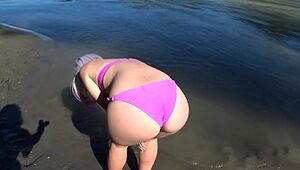 Lesbians rest and screw on the river bank. Girlfriend with a hairy cooch in a bathing suit doggystyle wiggles a massive butt. Pov Outdoors.